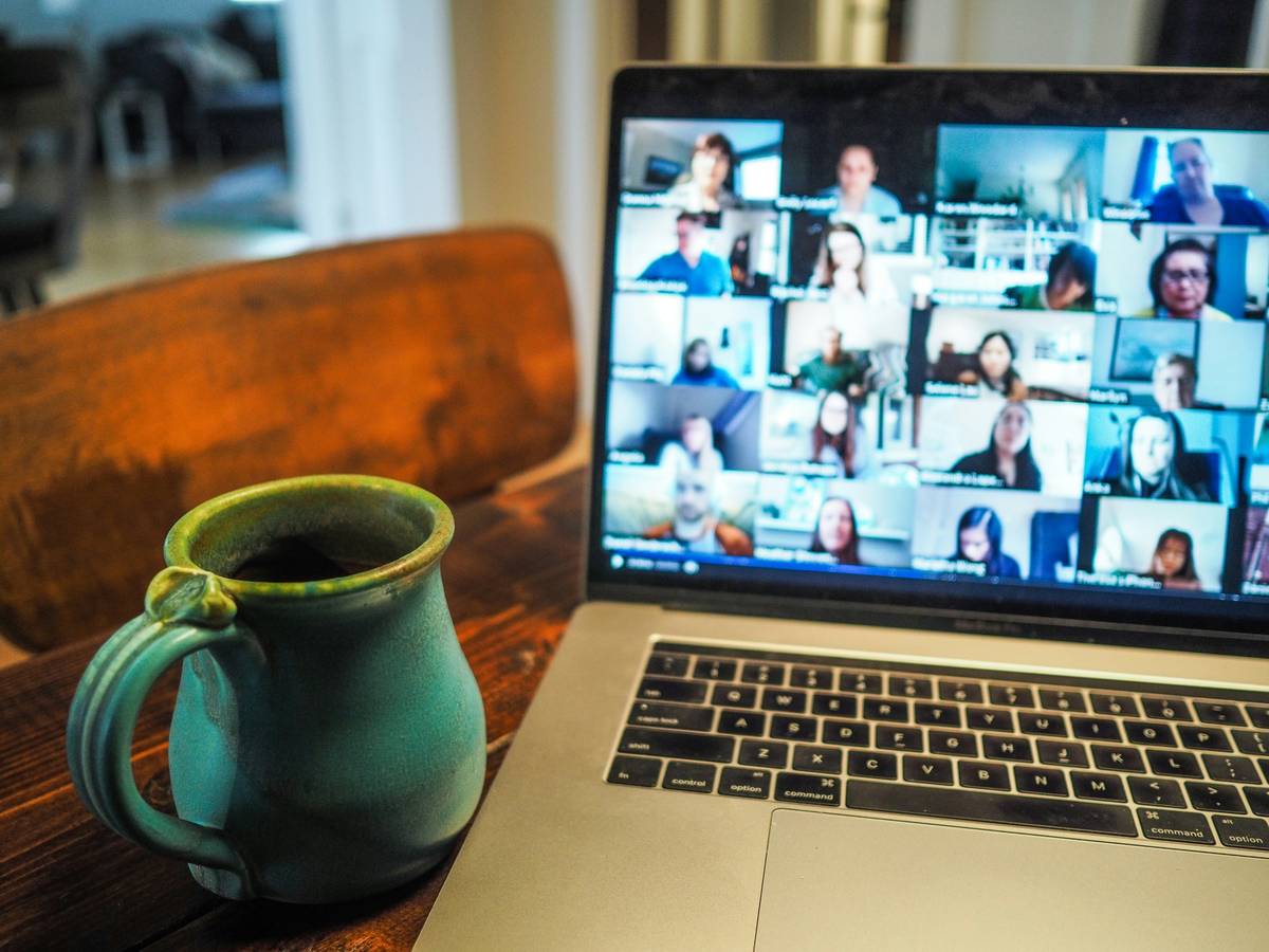 Diverse group video-calling with cultural symbols; cultural sensitivity intercultural competence which aspect