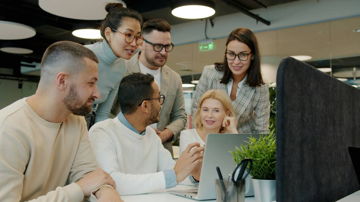 Team in virtual meeting showing diverse facial expressions; communication skill intercultural competence international negotiation in action